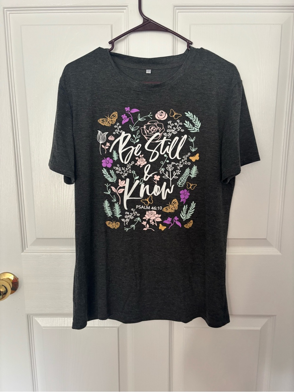 Amazon Women's Dark Gray Short Sleeve Tee with Floral "Be Still & Know" Graphic